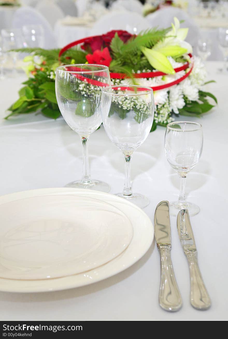 Detail of beautifully serbed white dinner table. Detail of beautifully serbed white dinner table