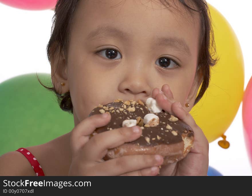 Girl eating donut