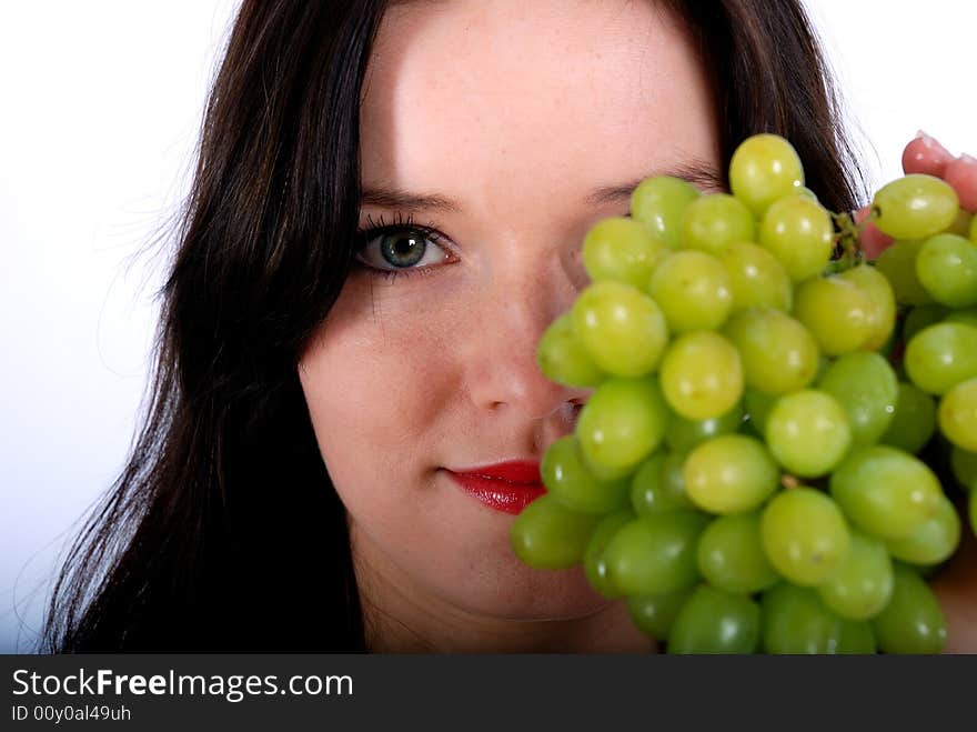 Green grape and nice women, isolated fruit. Green grape and nice women, isolated fruit