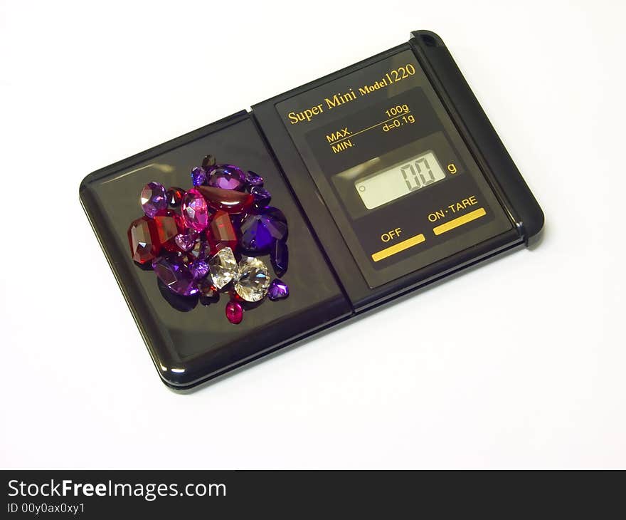 Jeweller balance on a white background