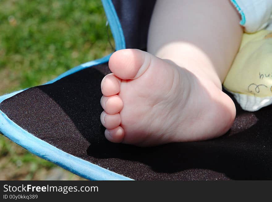 Baby s foot in carriage.