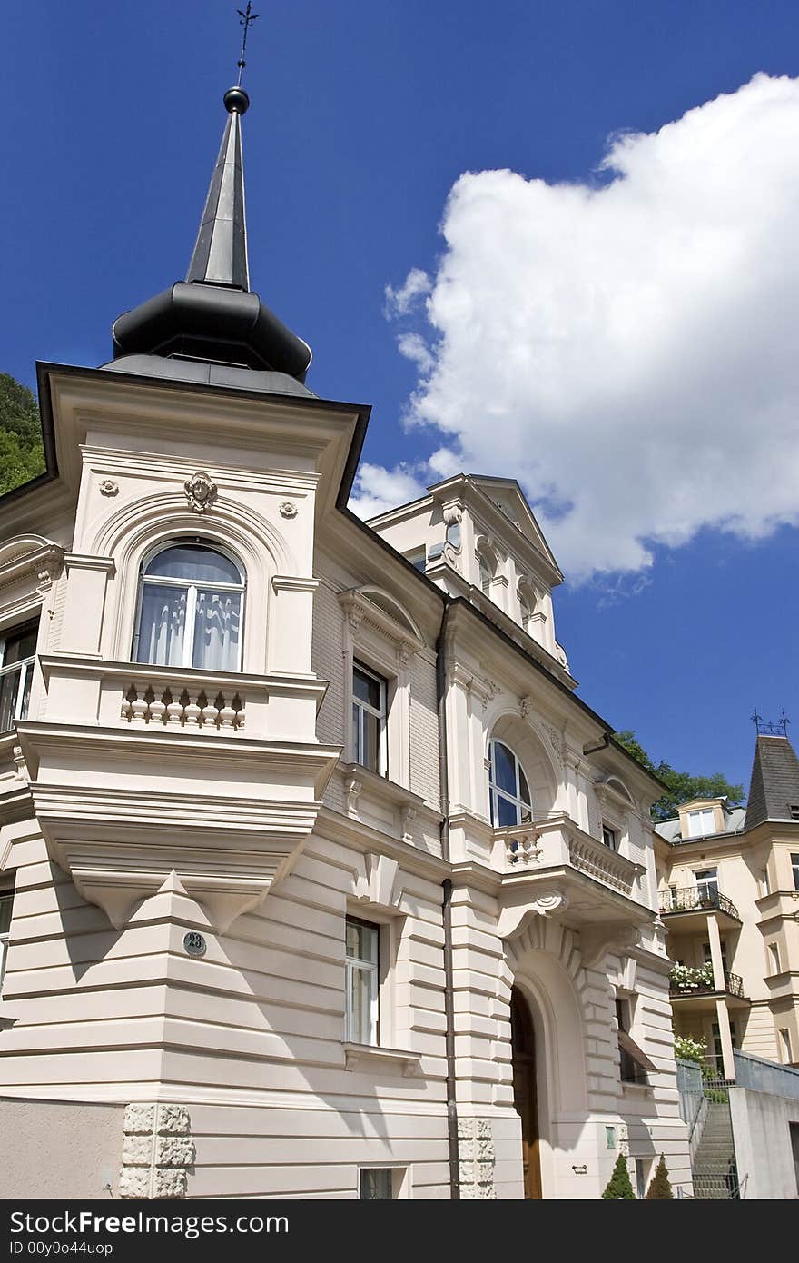 An European styled house on a summer sky background. An European styled house on a summer sky background