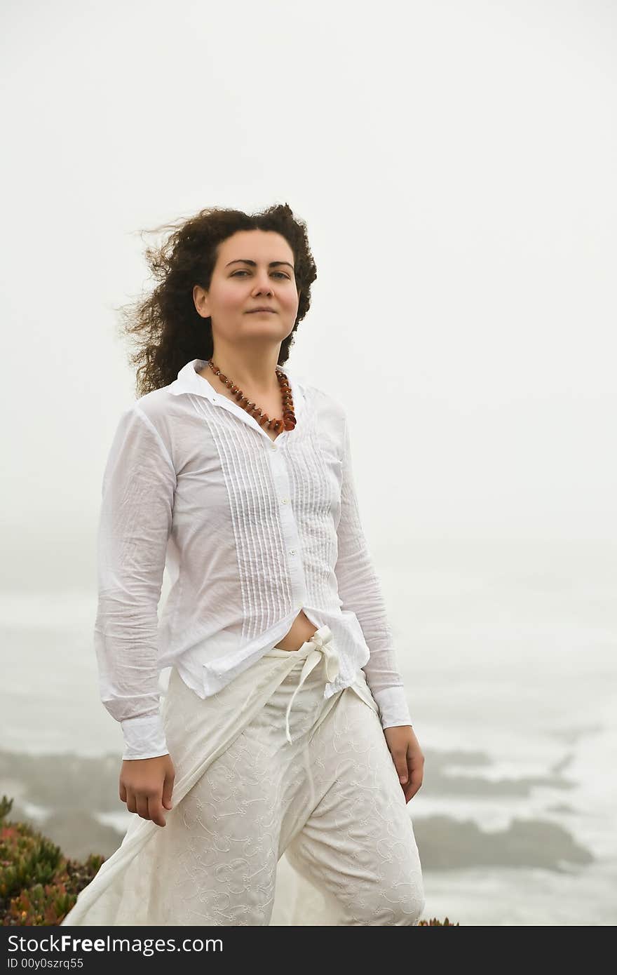 Portrait of attractive young woman on the beach