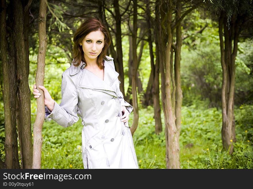 Nature Lifestyle. Young Woman In The Park.