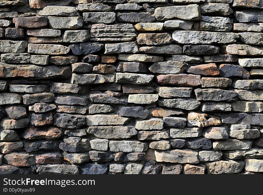 Stone wall with different stones