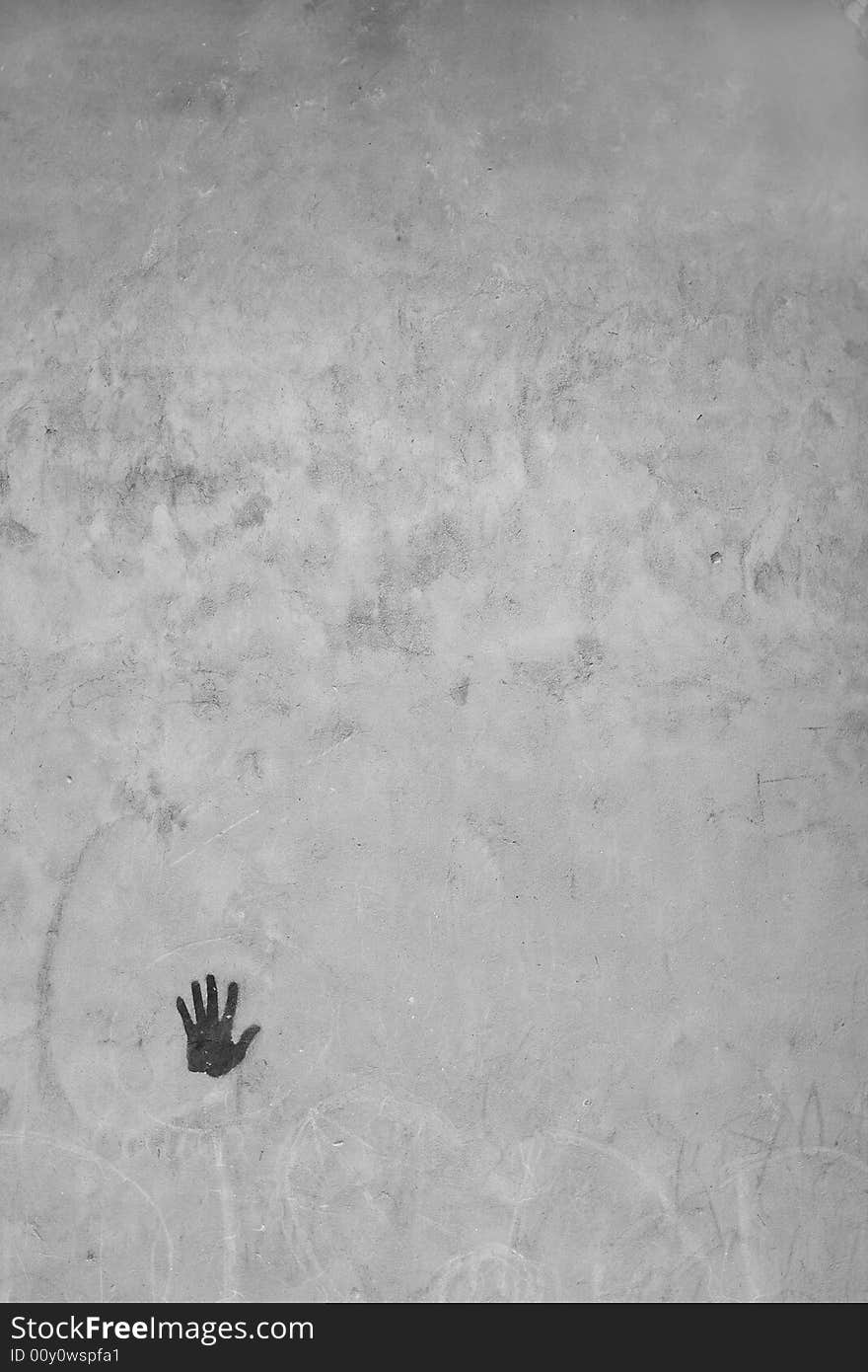 Concrete wall with a graffity of hand. Concrete wall with a graffity of hand