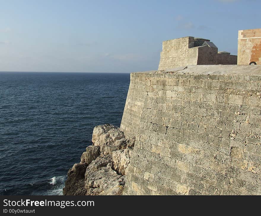 The Morro Fortress wall and a blue sea, Cuba