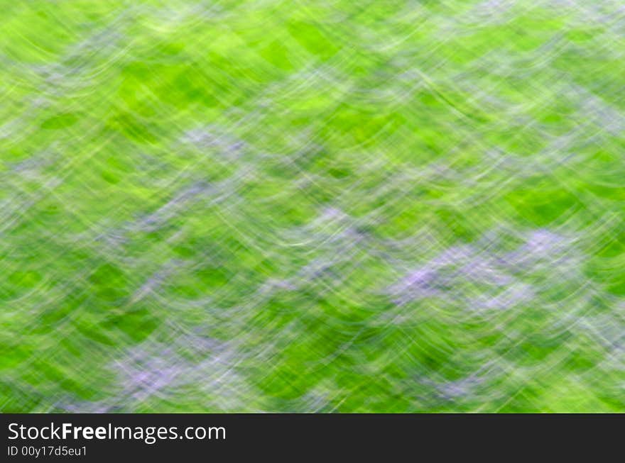 Motion blur of field of lavender creating abstract pattern. Motion blur of field of lavender creating abstract pattern