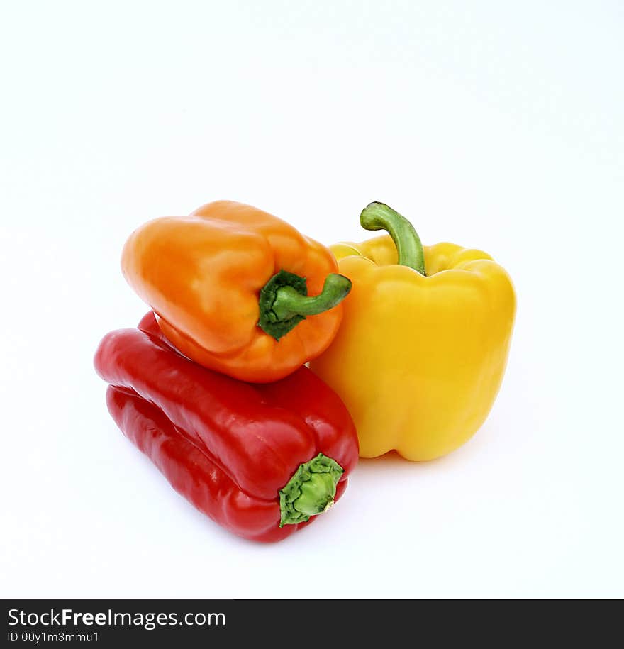 Three peppers in diferent colors. Three peppers in diferent colors