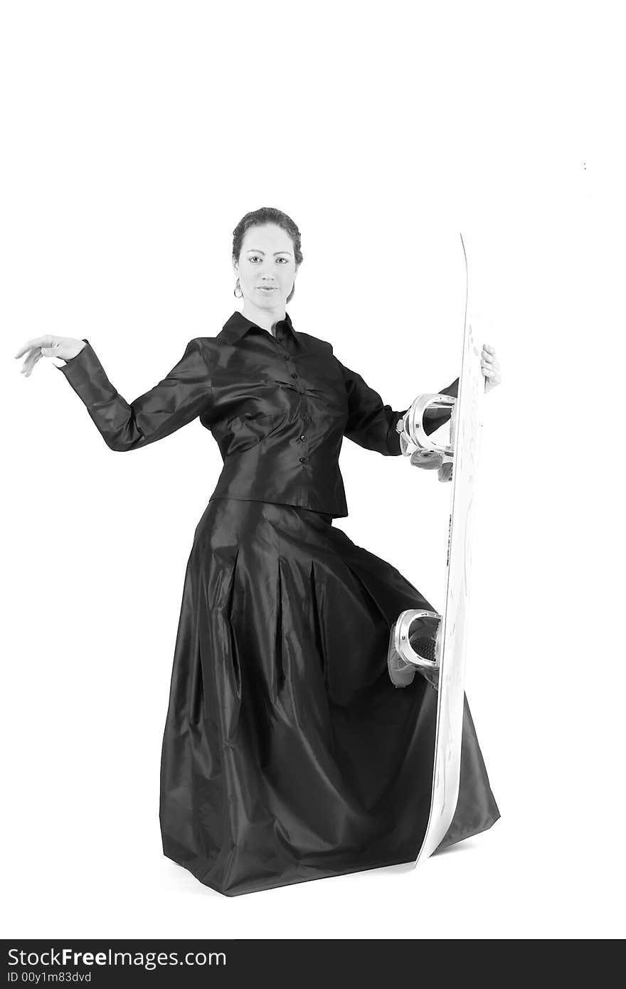 Portrait of a woman with long curly hair standing dressed for gala with a snowboard. Portrait of a woman with long curly hair standing dressed for gala with a snowboard