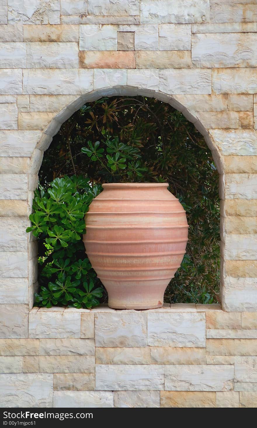 Traditional Greek Jar in a frame of window