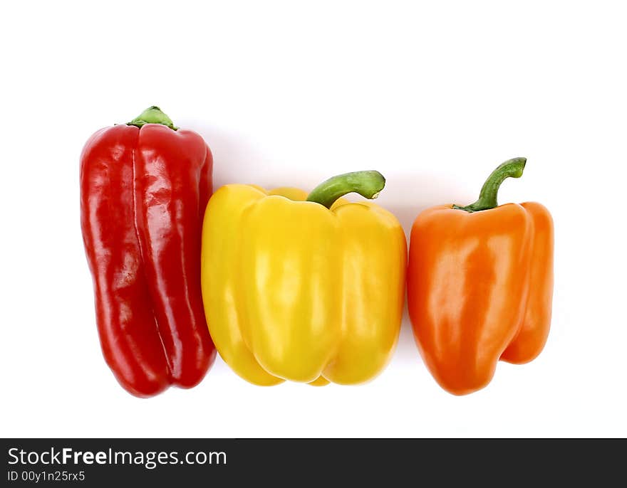 Three peppers in diferent colors