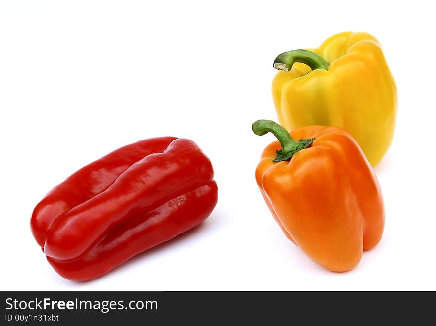 Three peppers in diferent colors. Three peppers in diferent colors