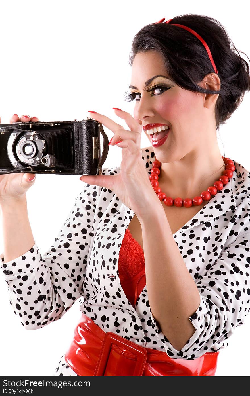 Beautiful woman holding retro camera. Beautiful woman holding retro camera