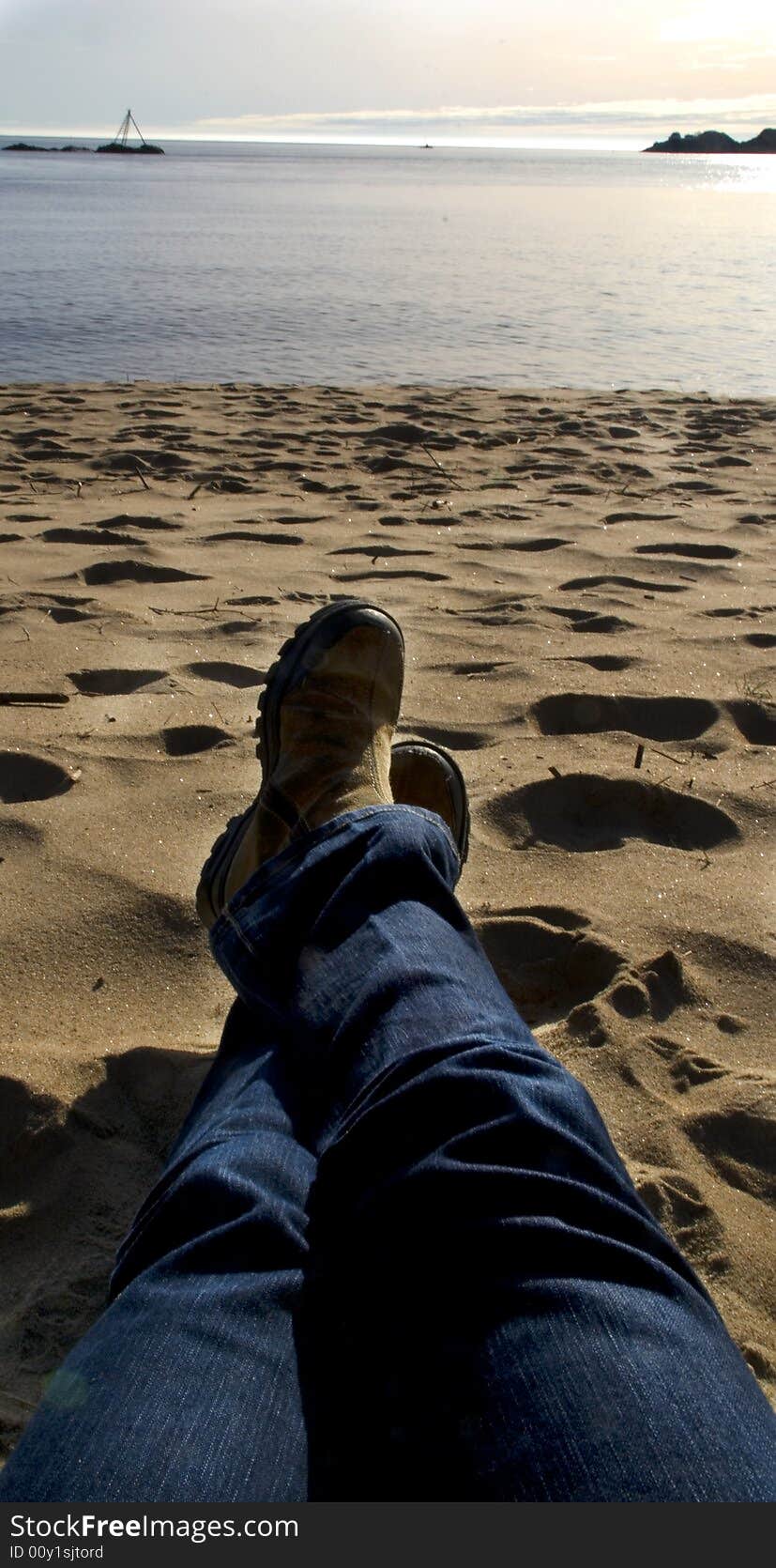 Relaxing On Beach In Norway