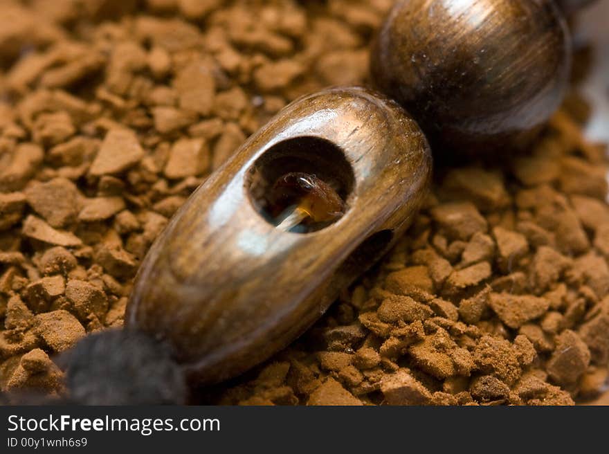 Coffee and wooden decoration with amber