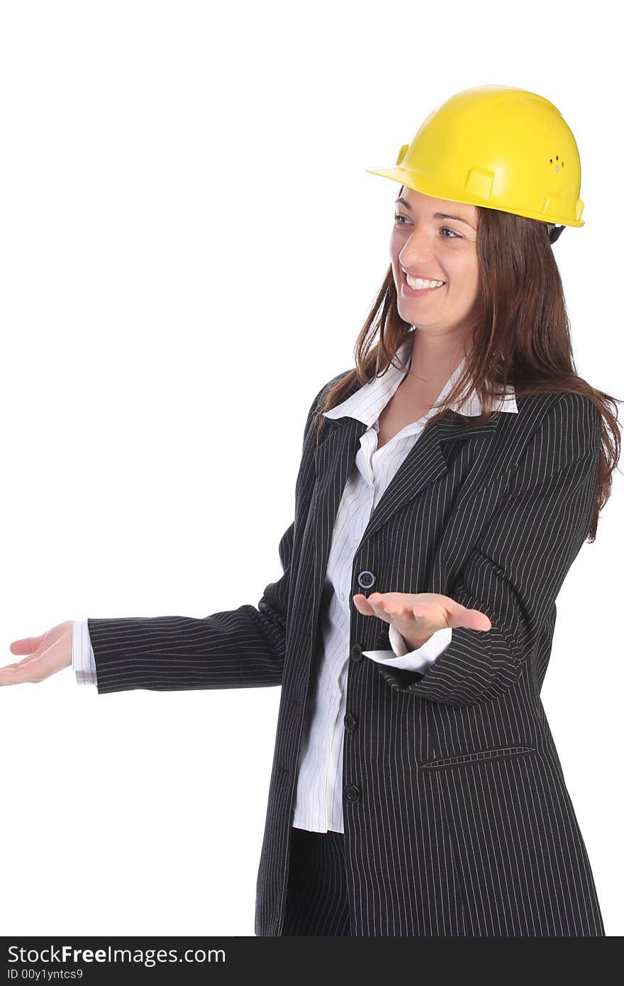 Young businesswoman with helmet on white background