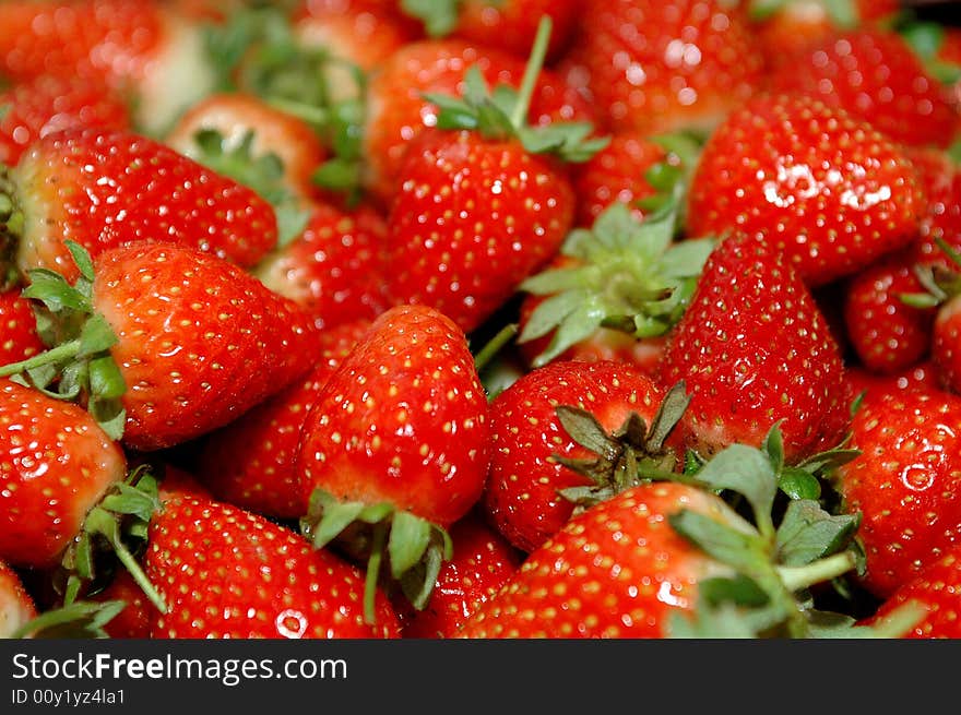 Photo with a lot of strawberries. Photo with a lot of strawberries