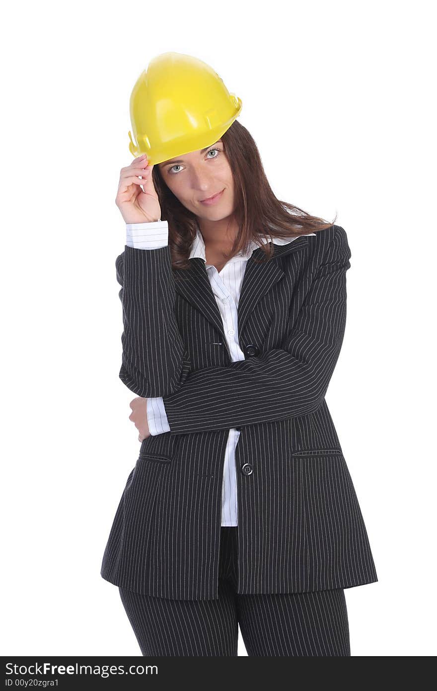 Young businesswoman with helmet on white background