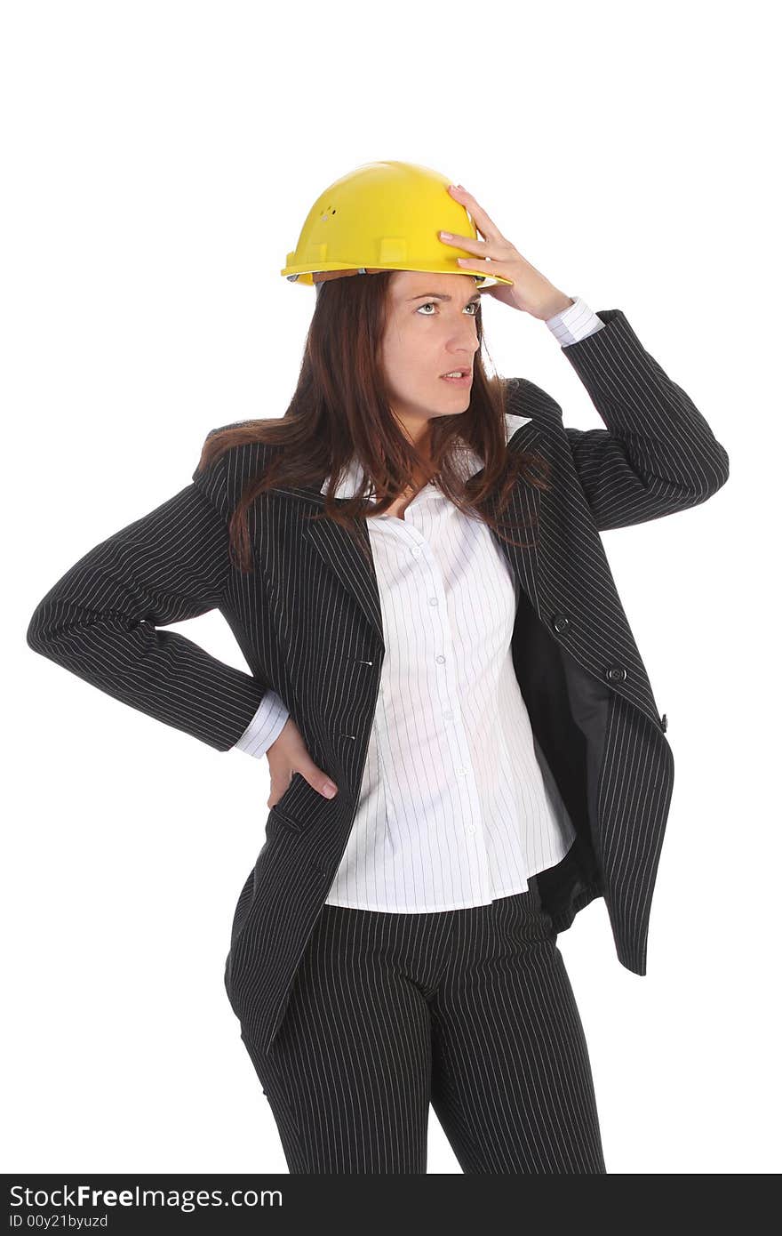 Young businesswoman thinking with helmet on white background