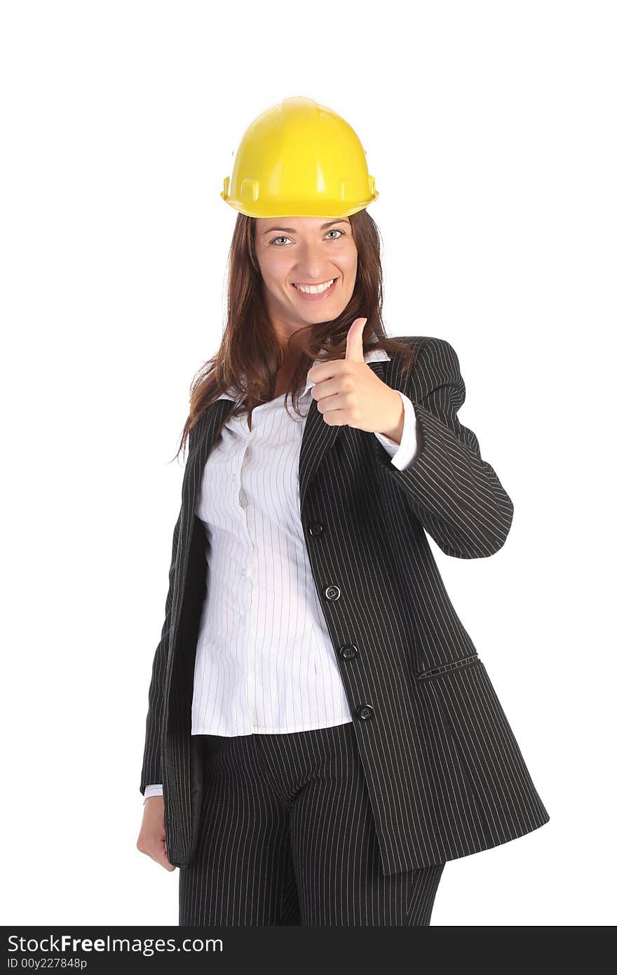 Young businesswoman with helmet on white background