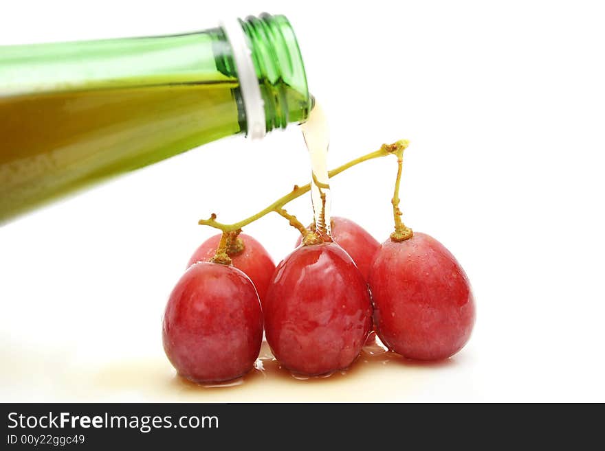 Wine Pour on Grapes