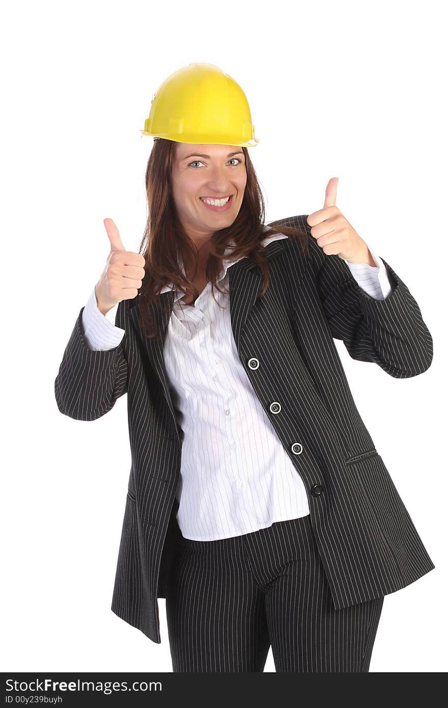 Young businesswoman with helmet on white background