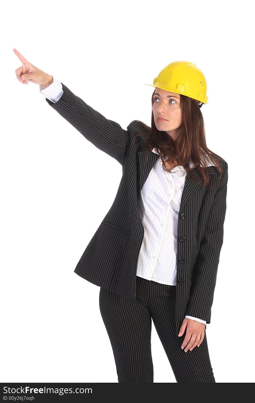 Young businesswoman pointing up on white background