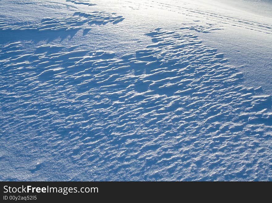 Fresh winter snow sunny texture. Fresh winter snow sunny texture