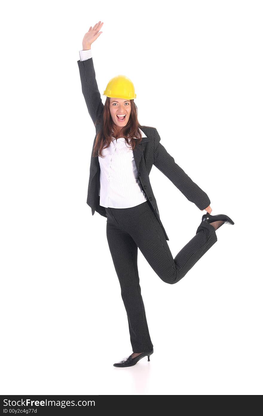 Young businesswoman with helmet on white background