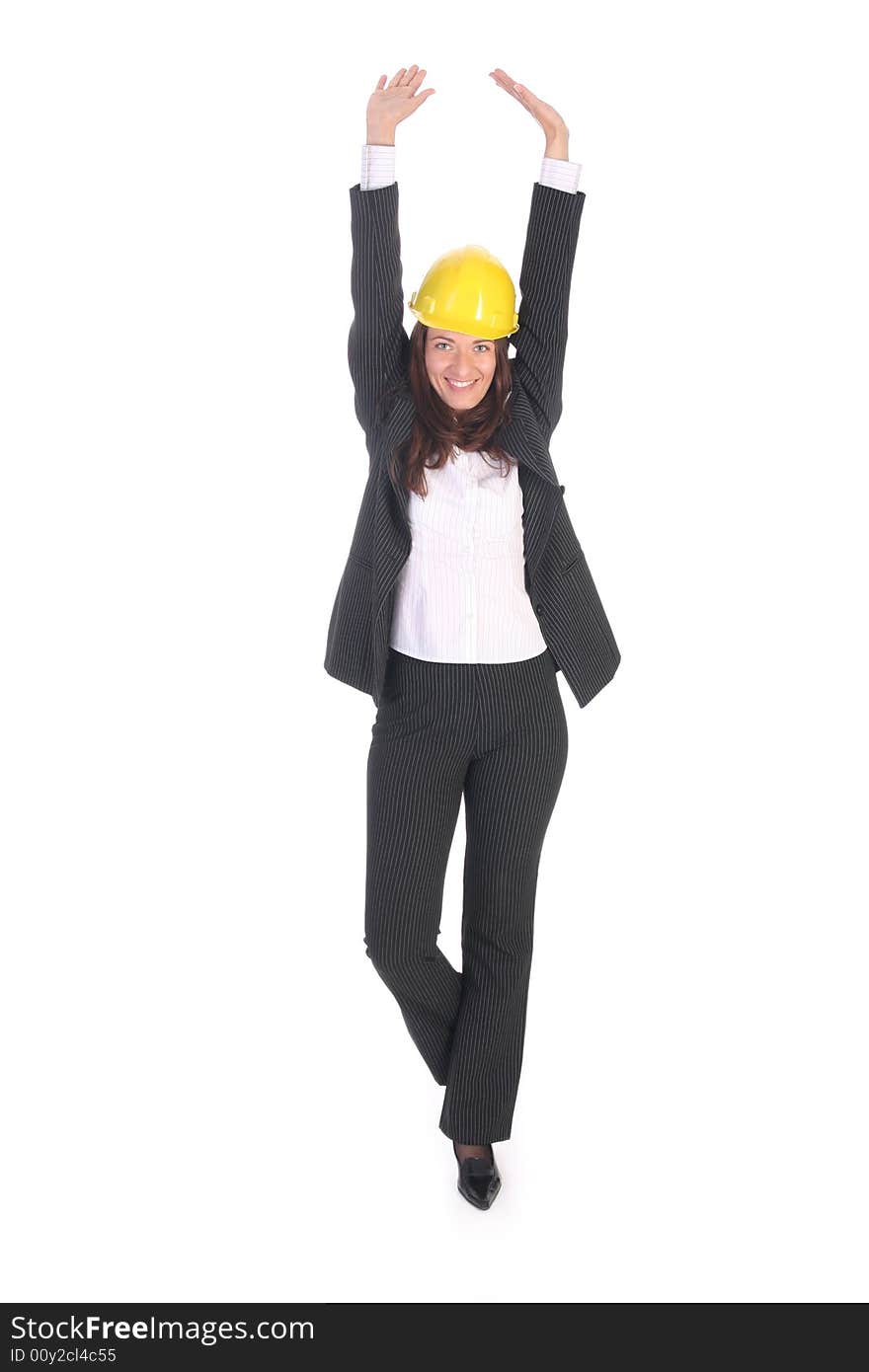 Young businesswoman with helmet on white background