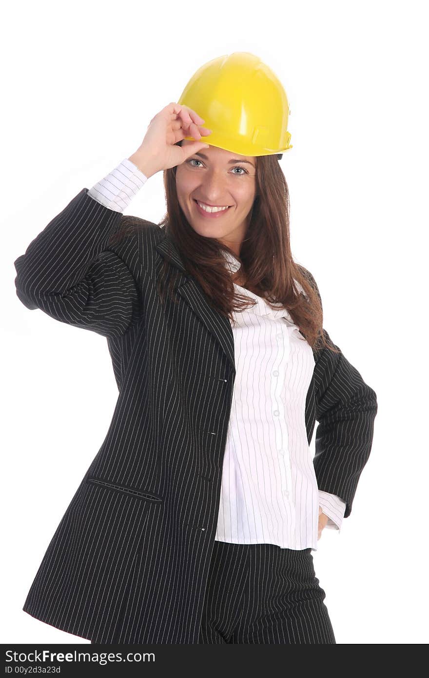 Young businesswoman with helmet on white background