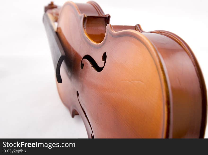 Violin closeup on a white background