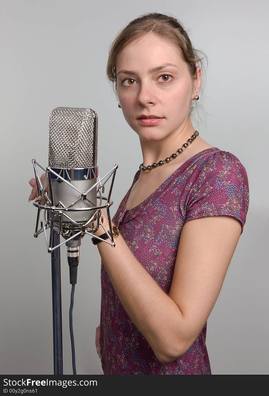 Girl with vintage microphone