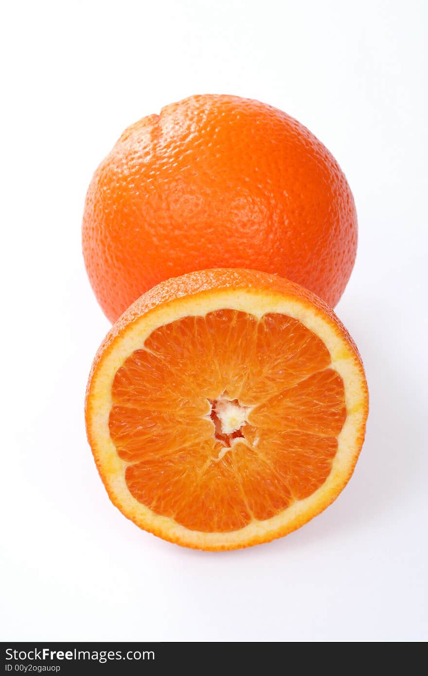 One and half orange isolated on white background