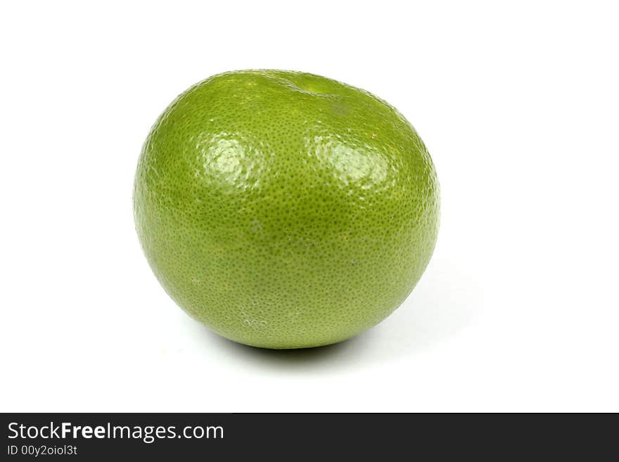 Green grapefruit isolated on white background