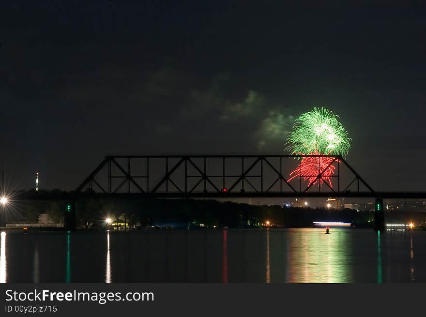 Firework and reflection on water