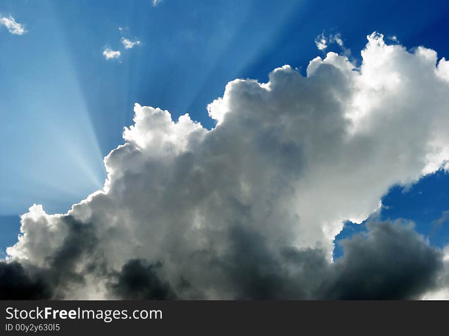 Cloudy sky and sunbeams.nice weather. Cloudy sky and sunbeams.nice weather