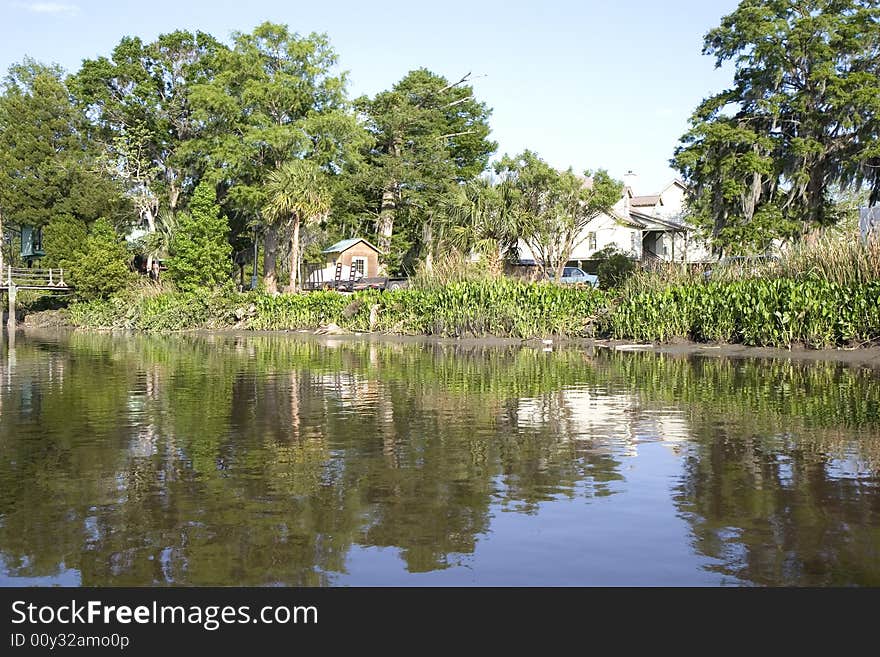 Old homes along a deep inter-coastal river. Old homes along a deep inter-coastal river