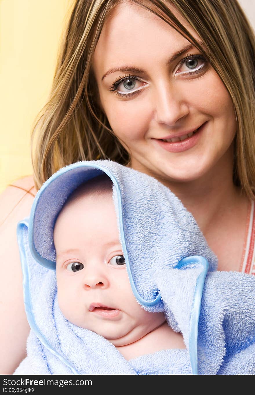 Mother's love. Cute baby 2 month with mother.