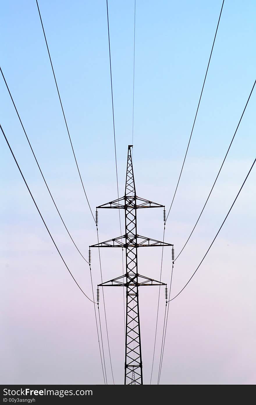 Heavy power line in perspective on blue sky