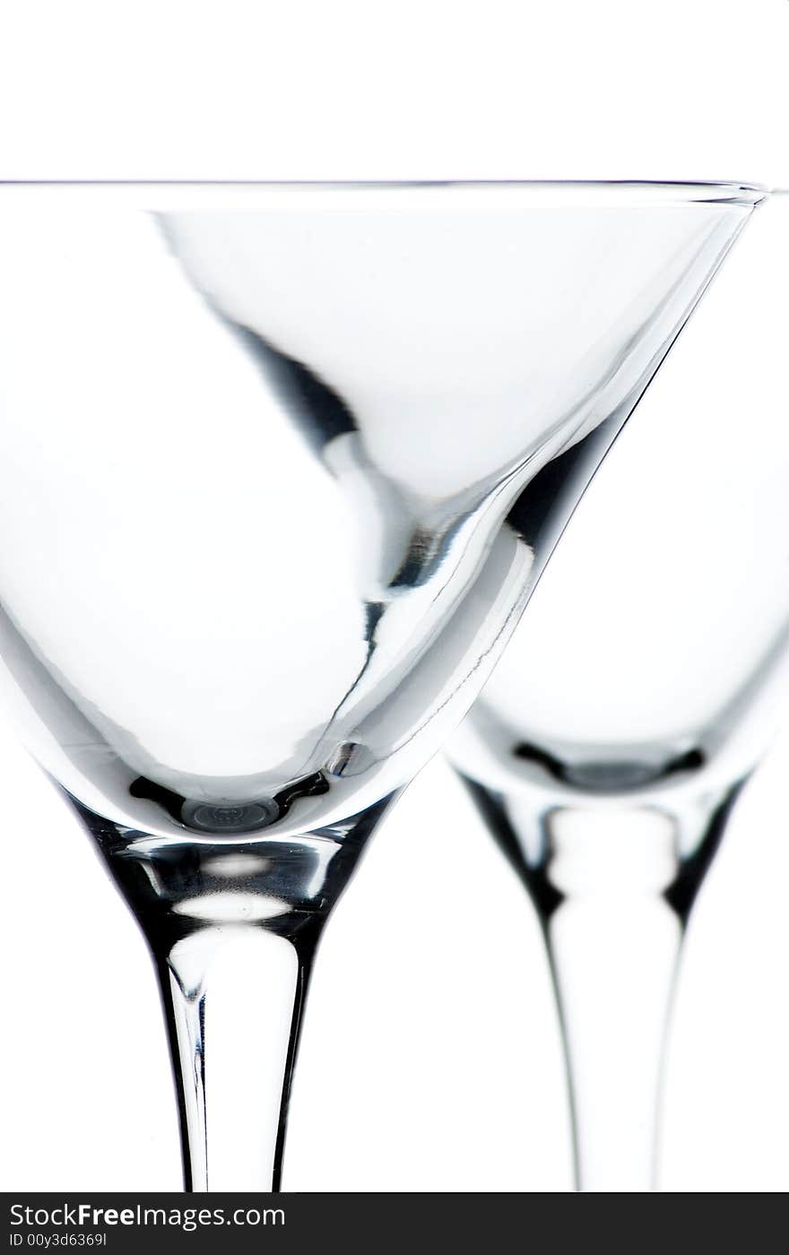 Close up of empty martini glasses on white background. Close up of empty martini glasses on white background