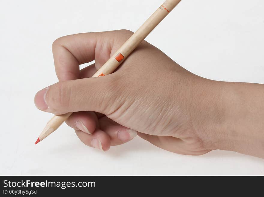 She is writing something with pencil. She is writing something with pencil.