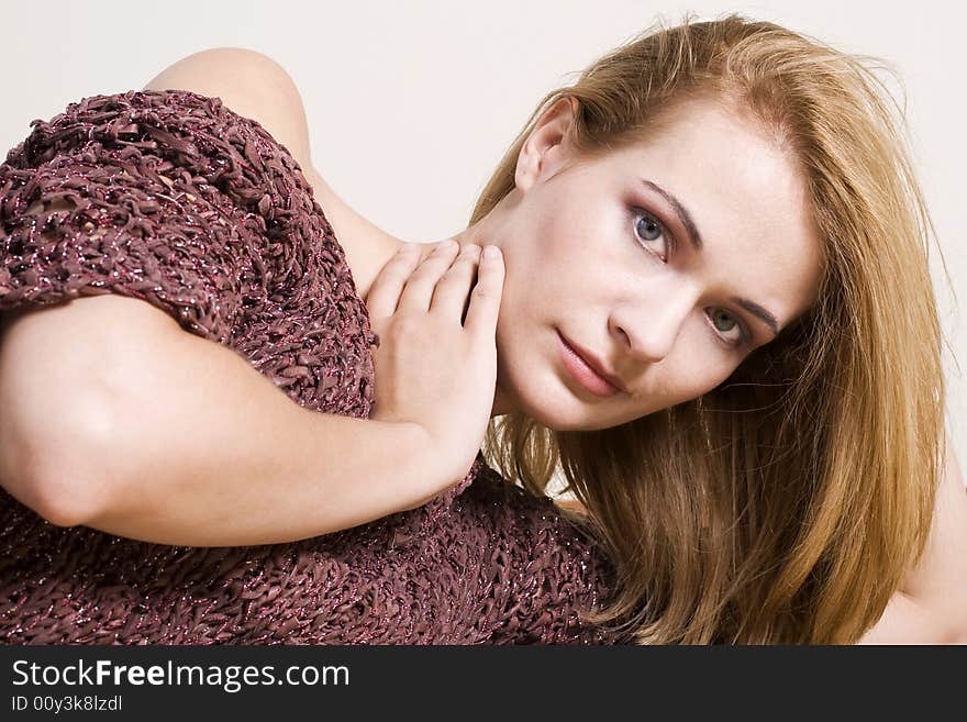 Blond with hand on neck