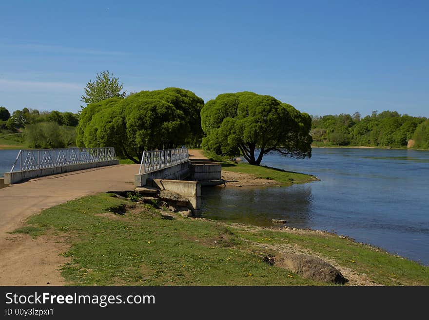 Old bridge through the river