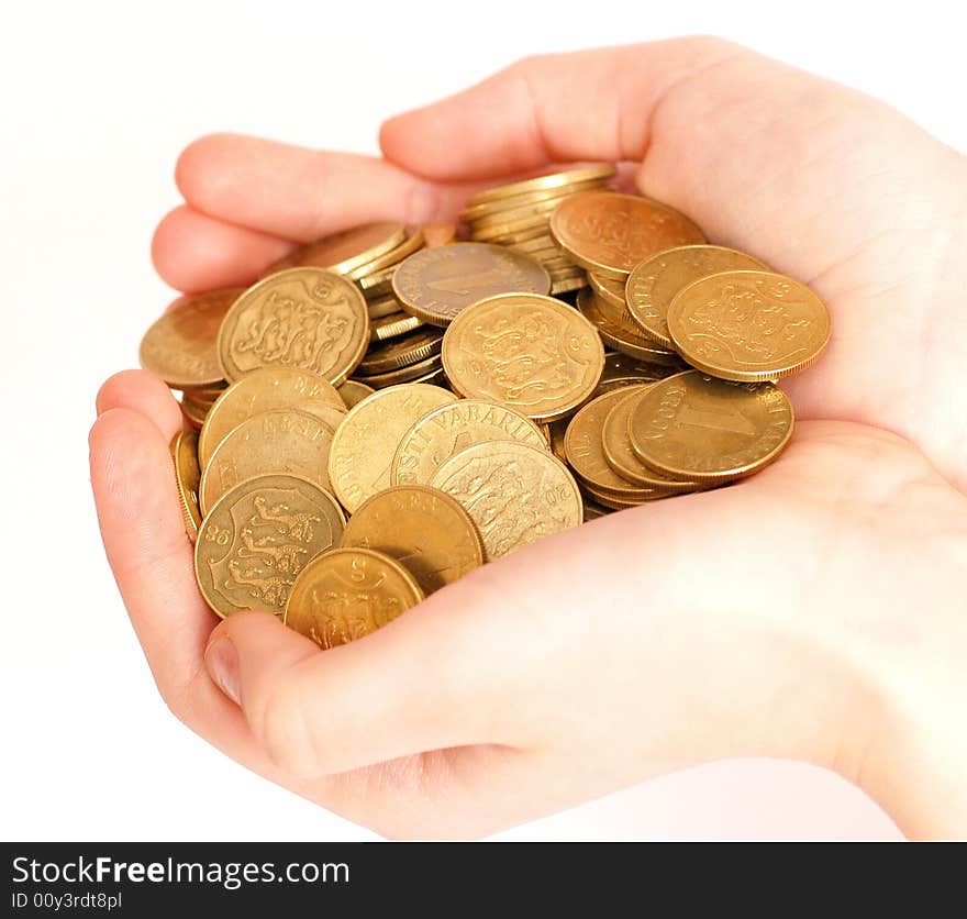 Human hand , holding metallic coins. Human hand , holding metallic coins