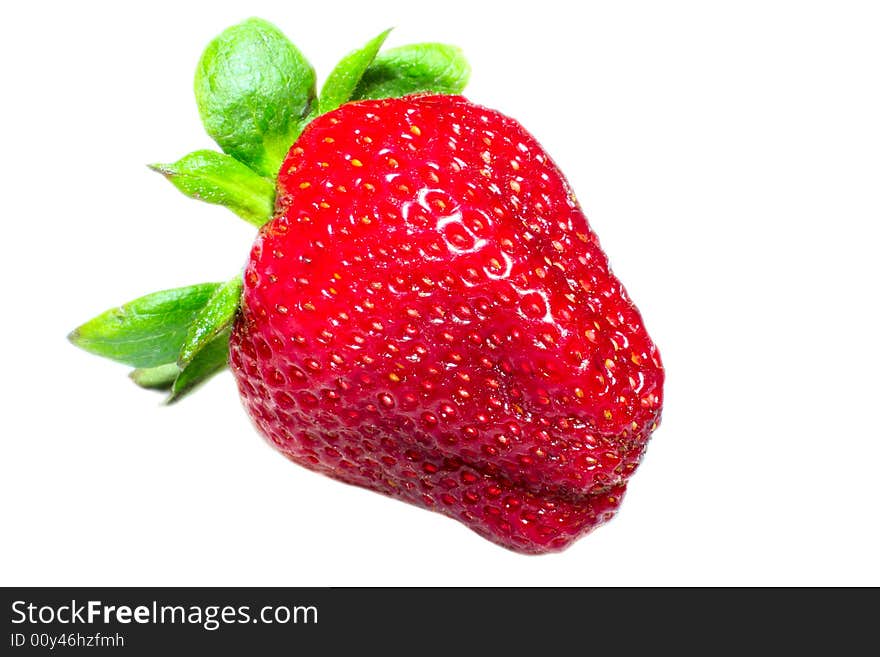 Close up of strawberry. Isolated over white background