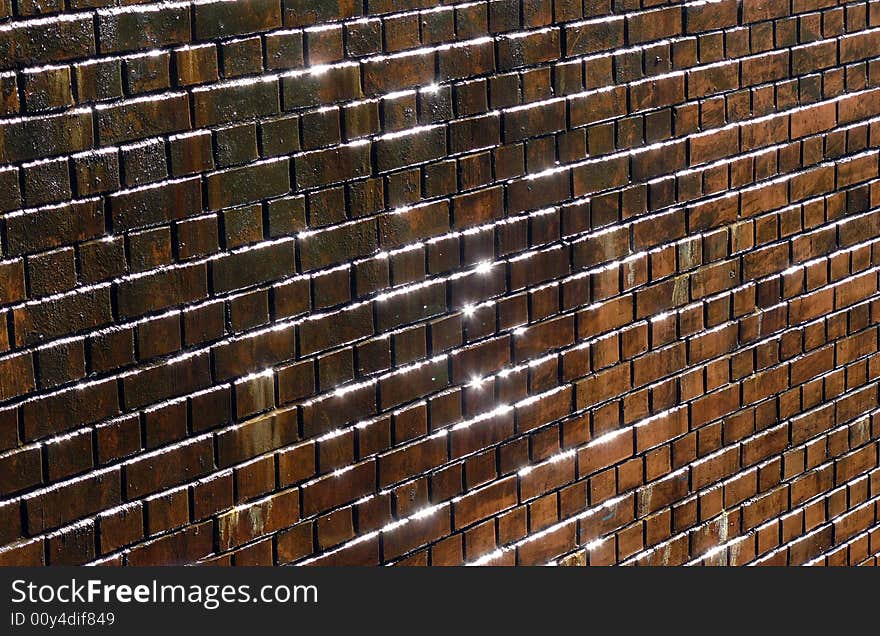 Shining brick wall, sun plus water. Shining brick wall, sun plus water