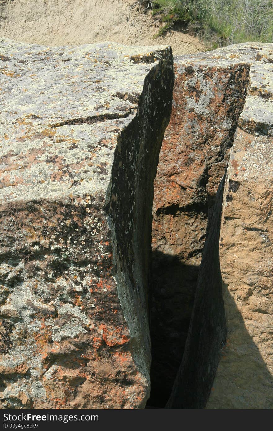 Close up detail of a rock naturally split in an S curve. Close up detail of a rock naturally split in an S curve