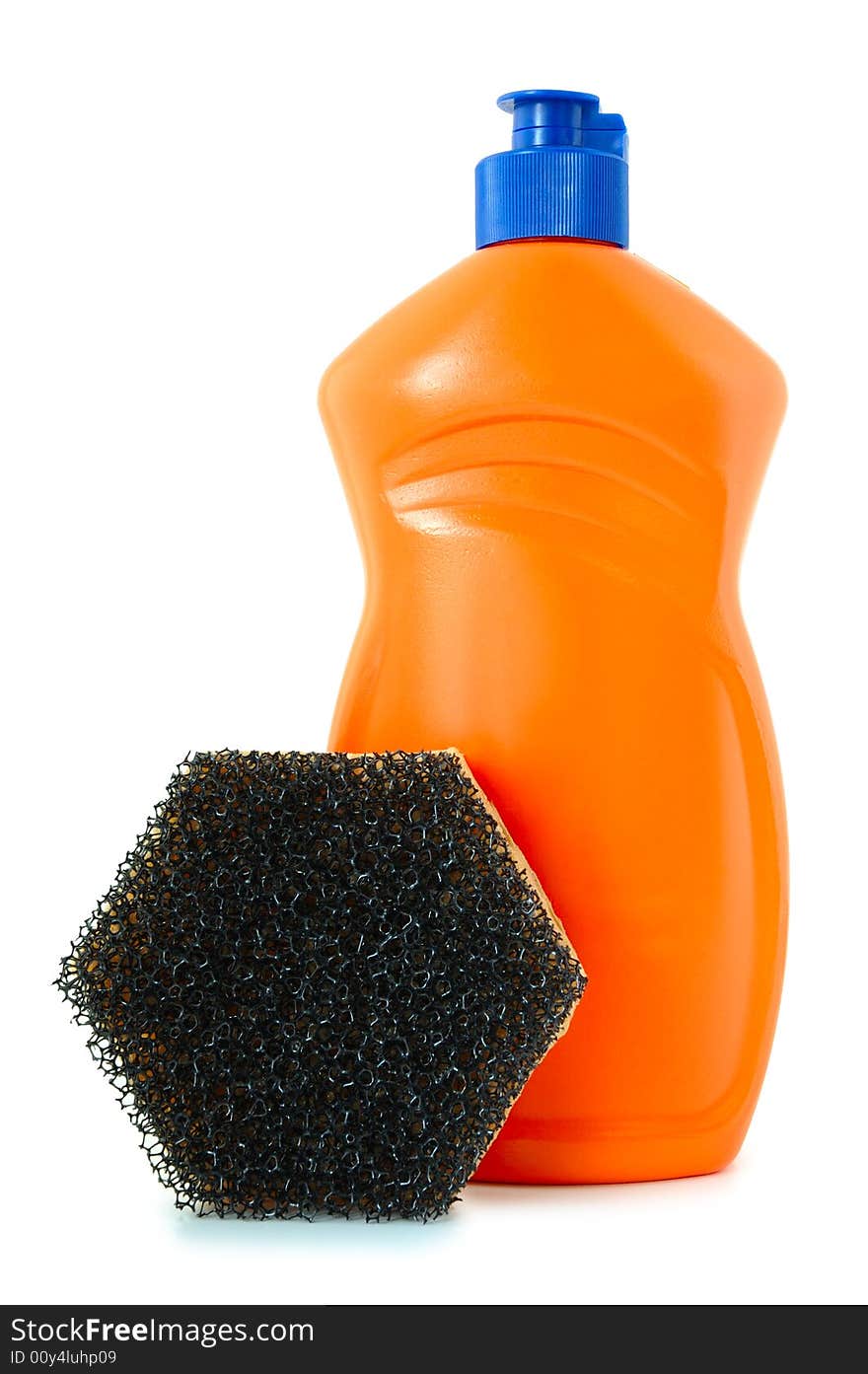 Detergent in orange plastic bottle and sponge on isolated background. Detergent in orange plastic bottle and sponge on isolated background